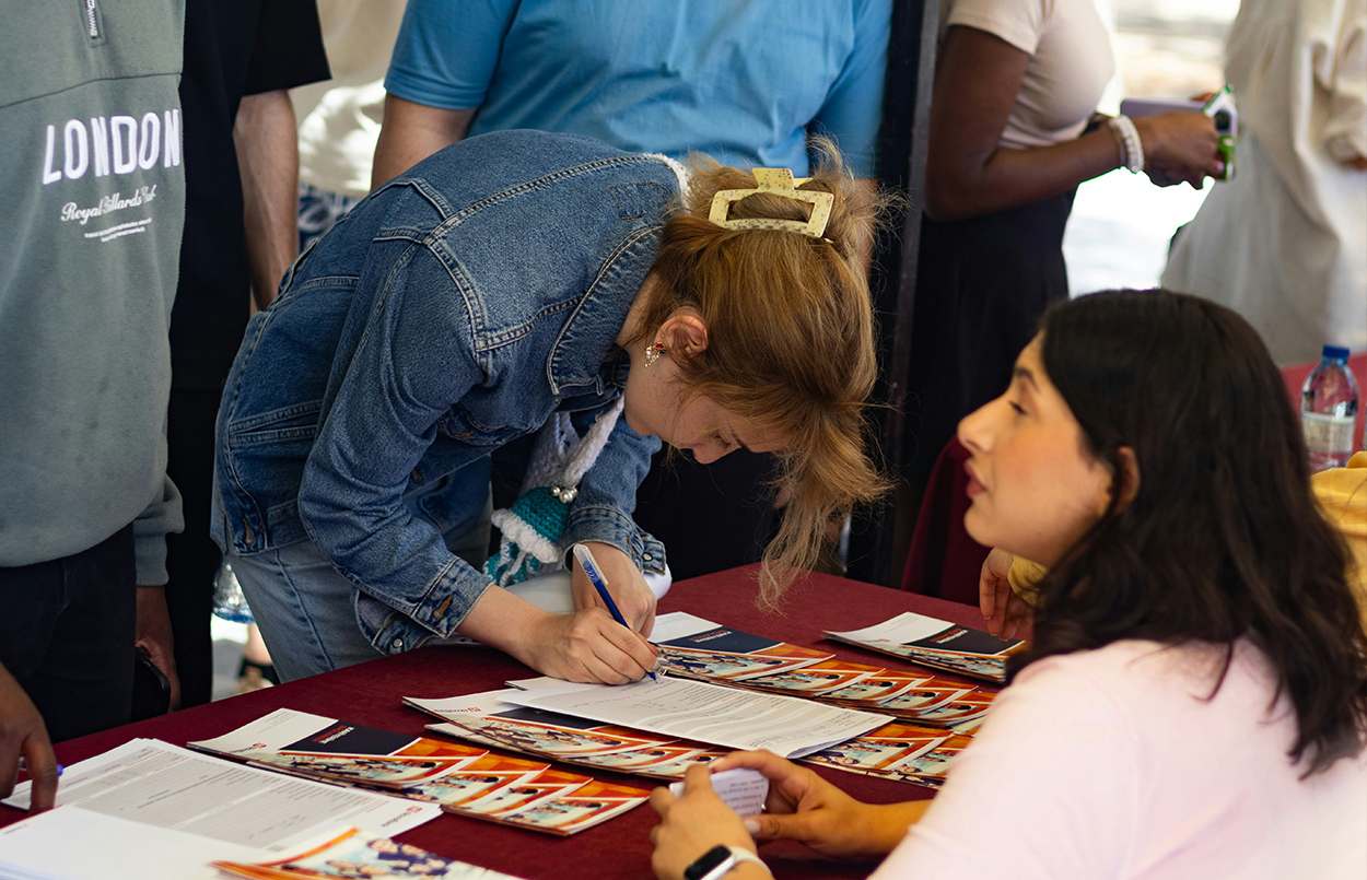 Professionals collaborating on an association initiative